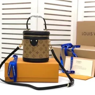 Louis Vuitton Beige Black Cylindrical Rigid Structure Monogram Canvas Bucket Bag