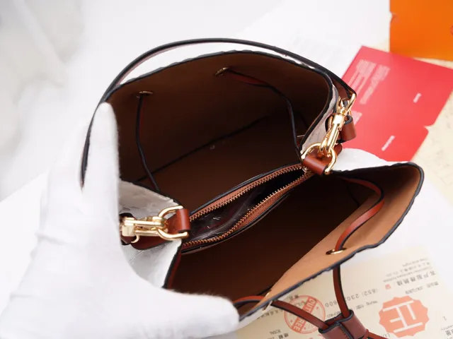 Louis Vuitton Black Gold Embossed Monogram Leather Drawstring Closure Bucket Bag 11