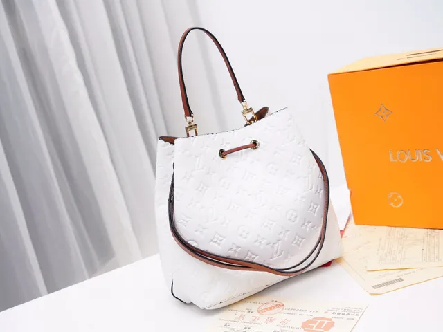 Louis Vuitton Black Gold Embossed Monogram Leather Drawstring Closure Bucket Bag 16