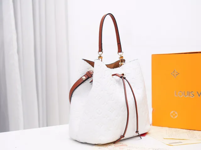 Louis Vuitton Black Gold Embossed Monogram Leather Drawstring Closure Bucket Bag 18