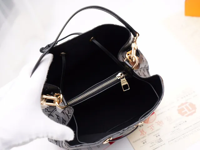 Louis Vuitton Black Gold Embossed Monogram Leather Drawstring Closure Bucket Bag 20