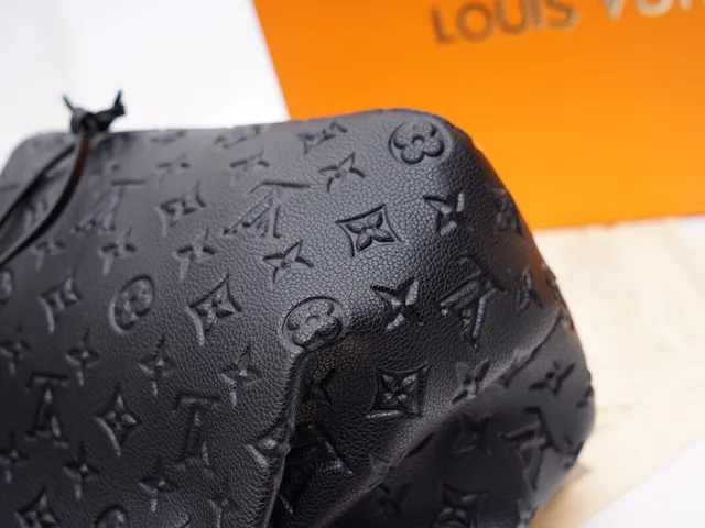 Louis Vuitton Black Gold Embossed Monogram Leather Drawstring Closure Bucket Bag 22