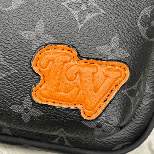 Louis Vuitton bolsa mensageiro de lona com monograma preto e laranja com borda de couro 5