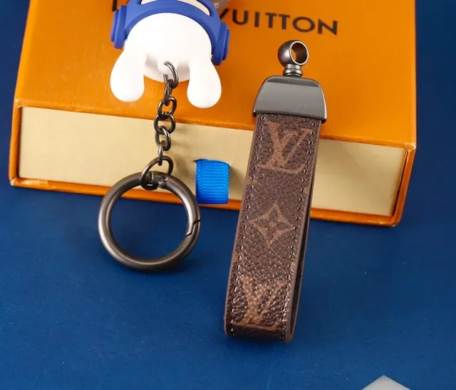 Louis Vuitton Blue Brown Monogrammed Leather Strap Vinyl Character Charm Handbag 2