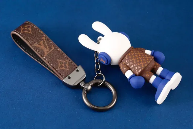 Louis Vuitton Blue Brown Monogrammed Leather Strap Vinyl Character Charm Handbag 5