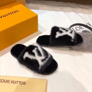 Louis Vuitton Zapatillas de piel negras y blancas con monograma