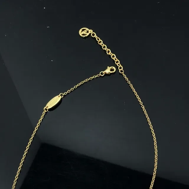 Louis Vuitton Gold Circular Pendant Necklace 3