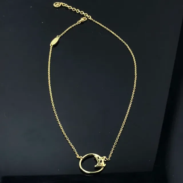 Louis Vuitton Gold Circular Pendant Necklace 4