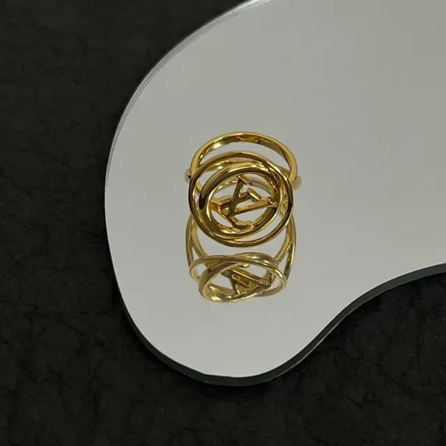 Louis Vuitton Gold Interlocking Loops Polished Ring 4