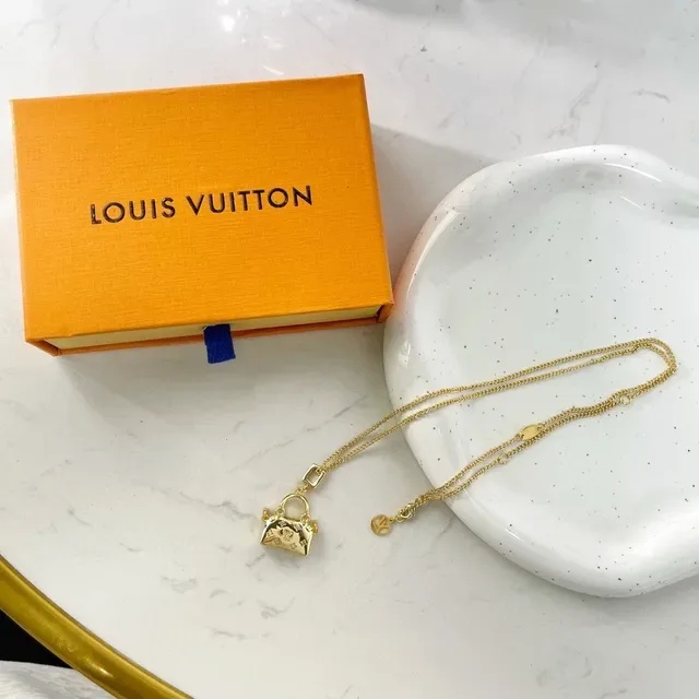 Louis Vuitton Gold Monogrammed Necklace 5