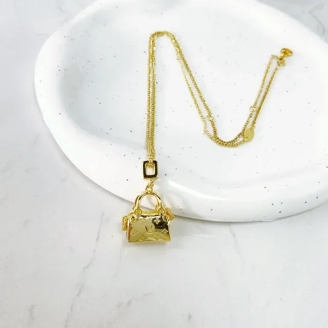 Louis Vuitton Gold Monogrammed Necklace 6