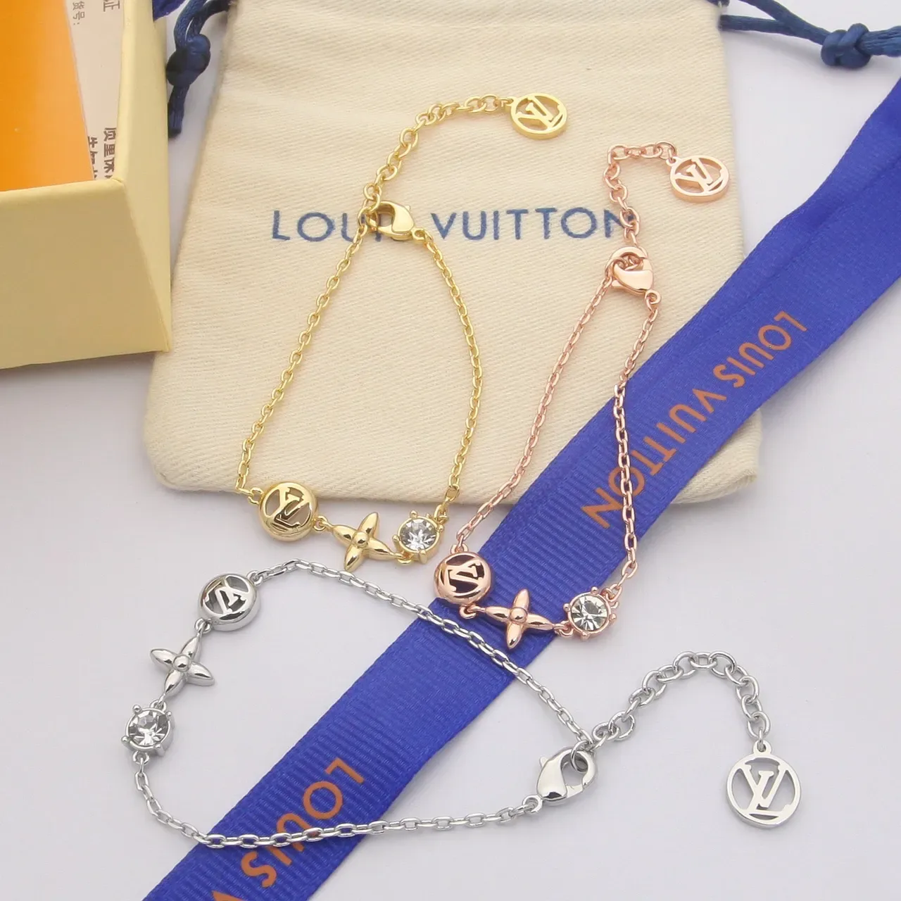 Louis Vuitton Gold-Tone LV Monogram Flower Crystal Charm Bracelet 7