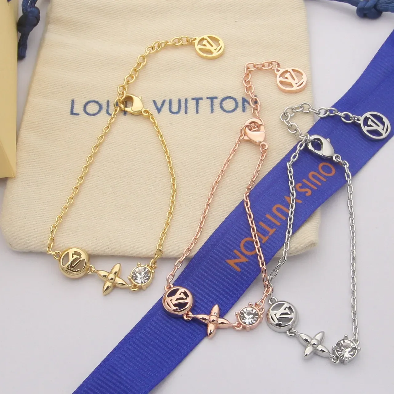 Louis Vuitton Gold-Tone LV Monogram Flower Crystal Charm Bracelet 8