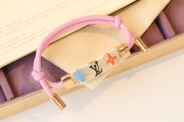 Louis Vuitton Les Parfums de Pink Transparent Braided Cord Cylindrical Charms Bracelet 4