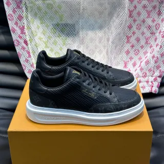 Louis Vuitton LV Trainer Black White Monogrammed Leather-Canvas Upper Ribbed Texture Detail Lifestyle Sneakers