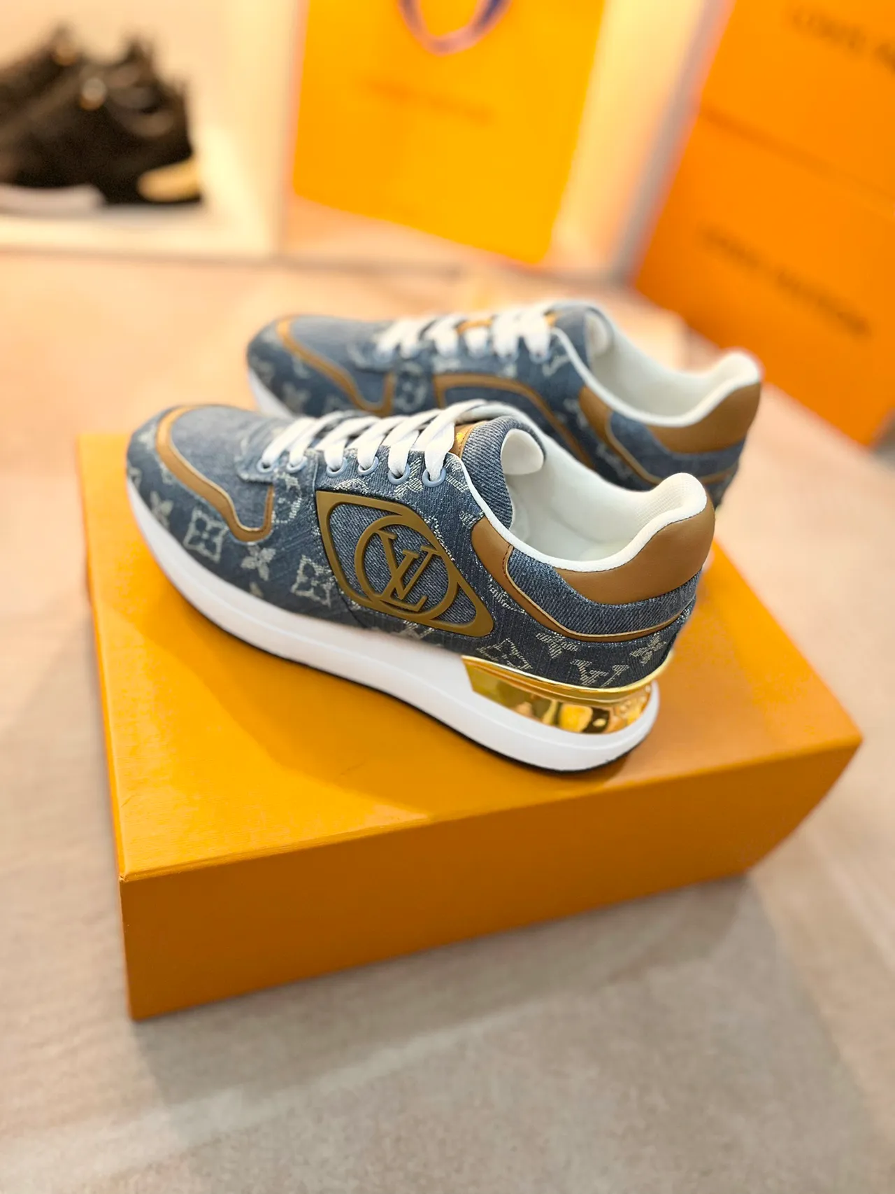 Louis Vuitton LV Trainer Blue Gold Monogram Denim Upper Logo Plaque Lifestyle Sneakers 4