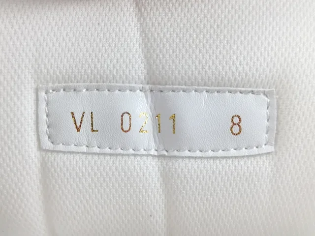 Louis Vuitton LV Trainer White Monogram-Embossed Leather Sculpted Layered Midsole Lifestyle Sneakers 12