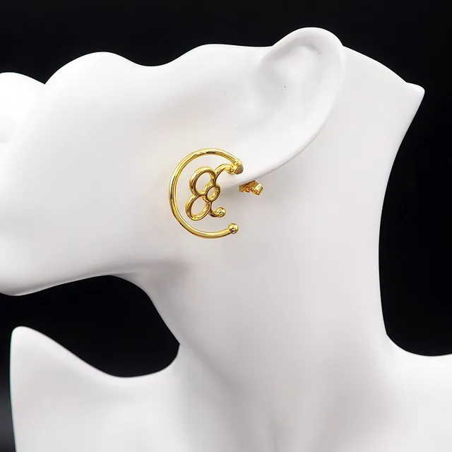 Louis Vuitton LV Twiggy Asymmetrical Gold-Tone Earrings 9