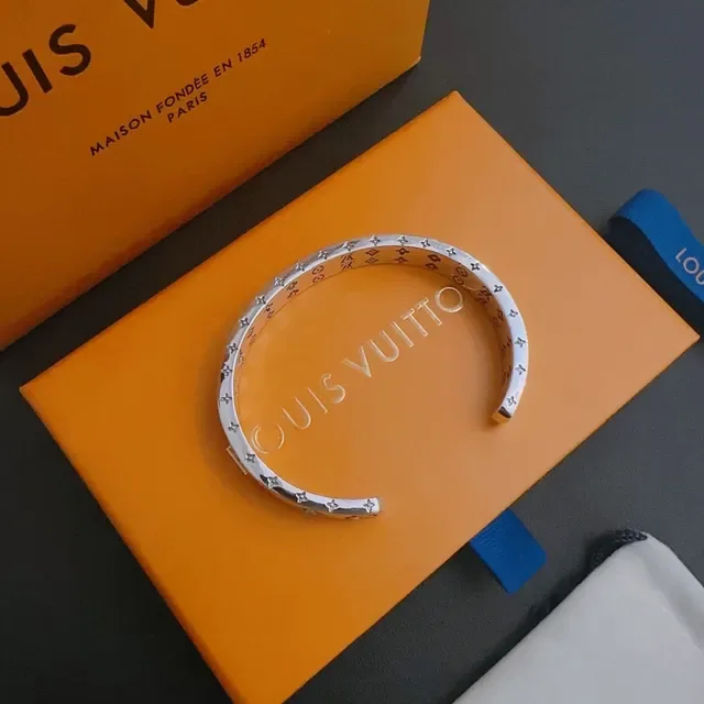 Louis Vuitton Monogram Flower Engraved Silver-Tone Bracelet 6