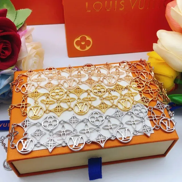 Louis Vuitton Monogram World Tour Gold-Tone Openwork Floral Link Bracelet 3