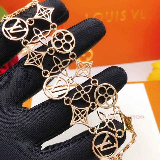 Louis Vuitton Monogram World Tour Gold-Tone Openwork Floral Link Bracelet 4