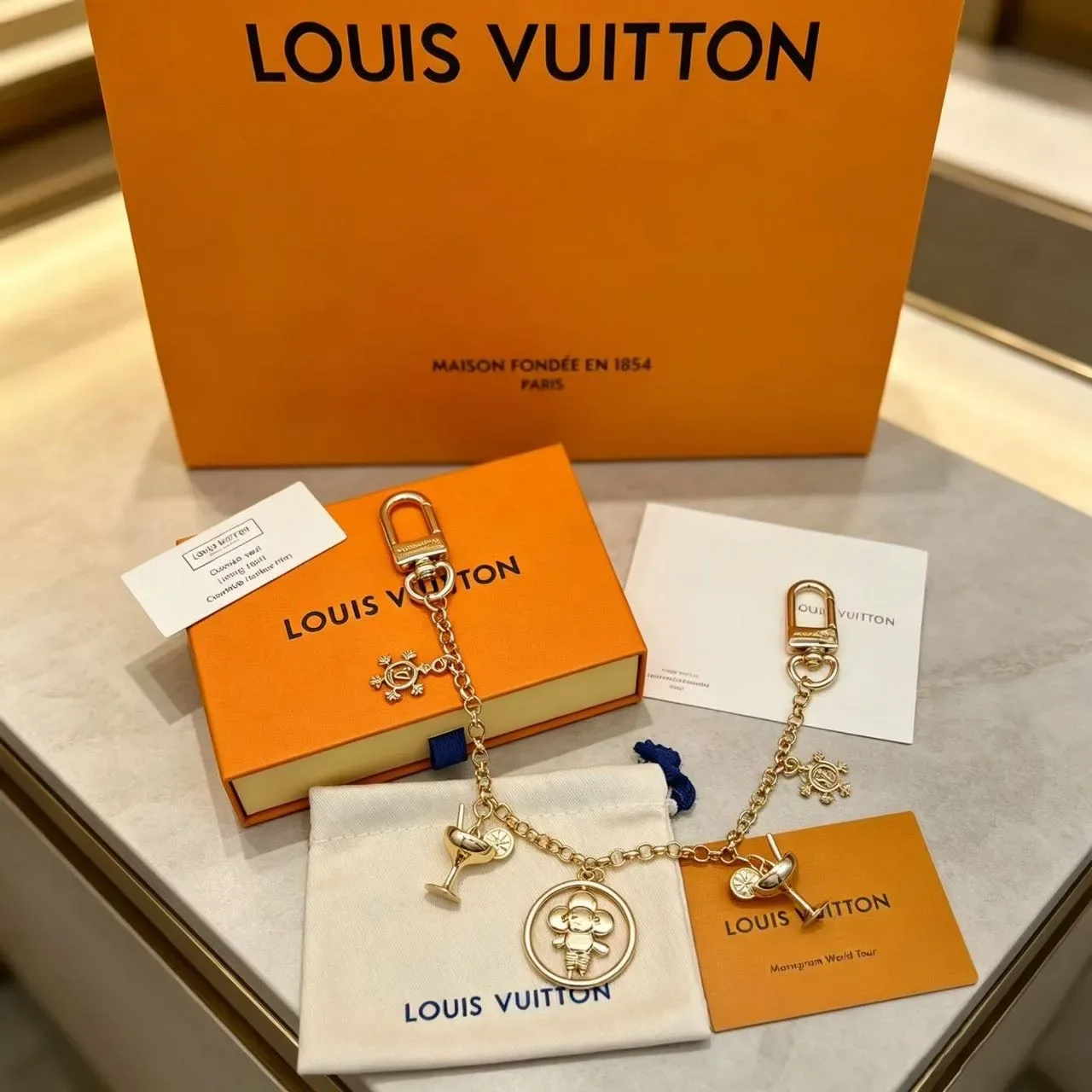 Louis Vuitton मल्टी-चार्म गोल्ड सिल्वर डुअल-टोन मेटल ब्रेसलेट 3