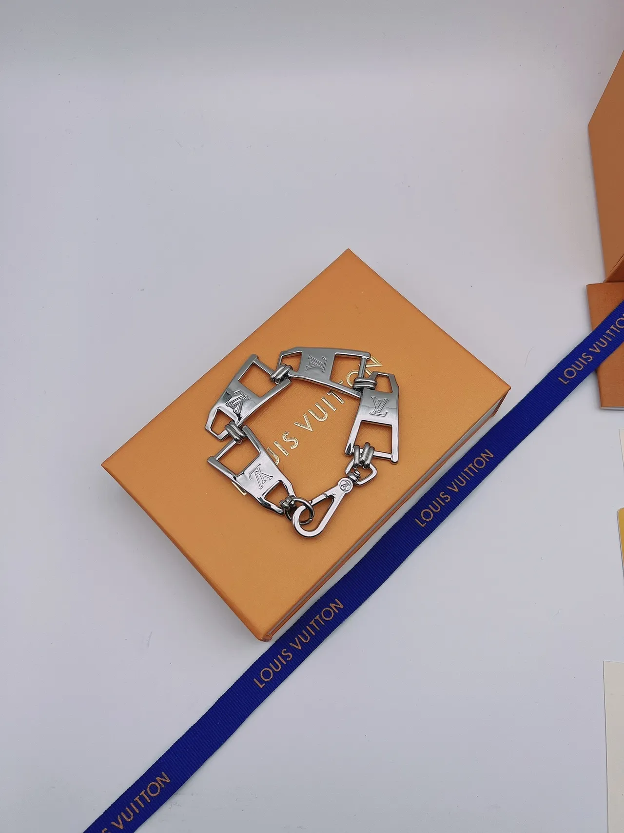 Louis Vuitton Silver Blue Articulated Metal Chain Engraved LV Monogram Bracelet 4