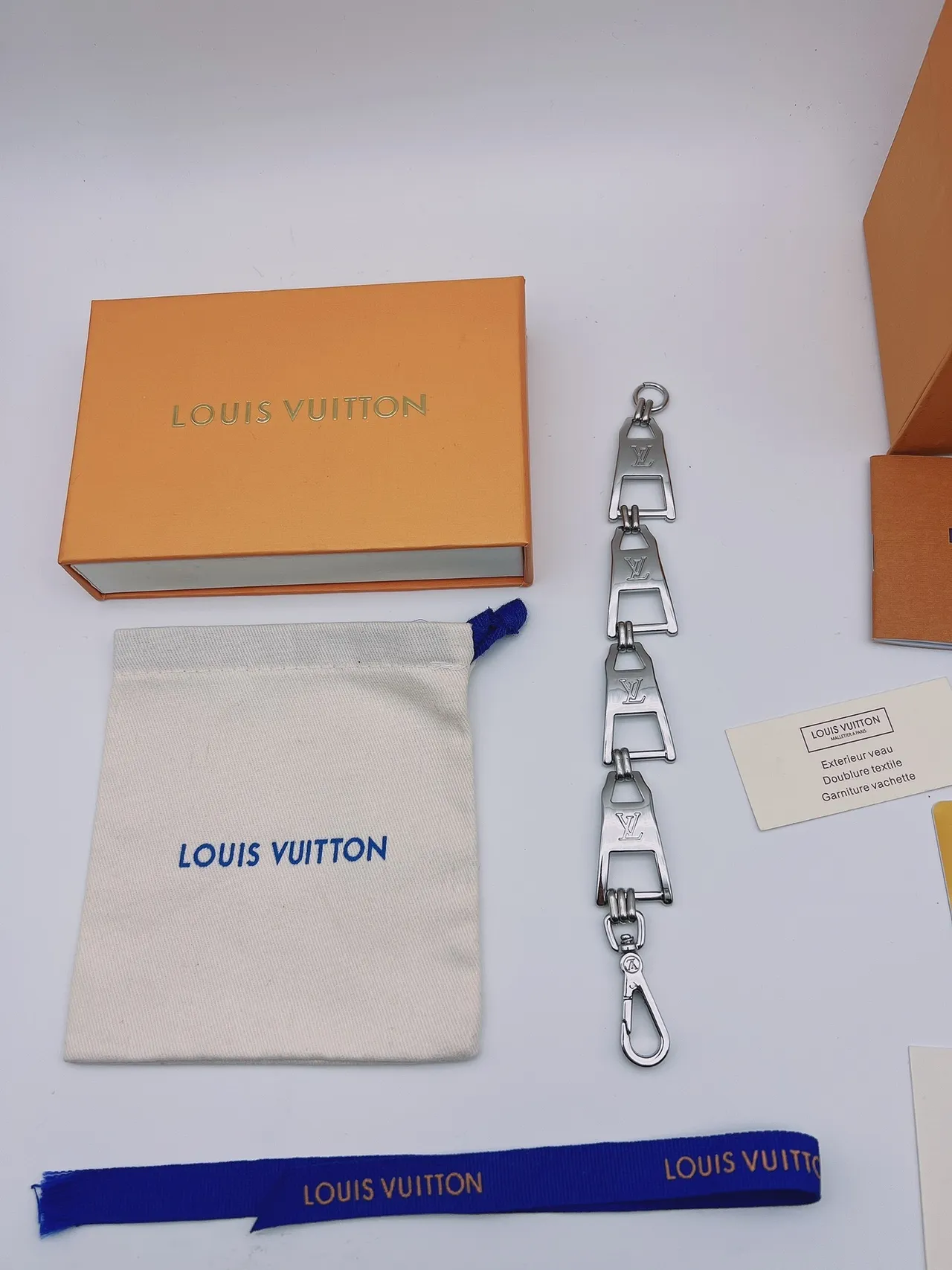 Louis Vuitton Silver Blue Articulated Metal Chain Engraved LV Monogram Bracelet 7