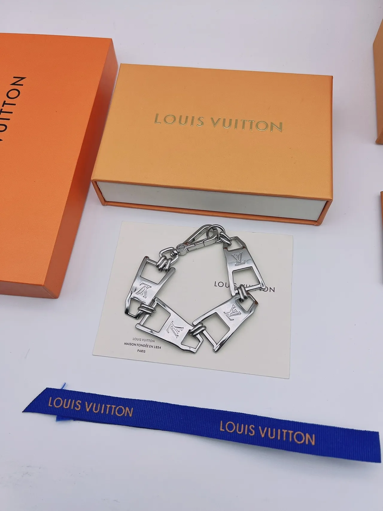 Louis Vuitton Silver Blue Articulated Metal Chain Engraved LV Monogram Bracelet 9