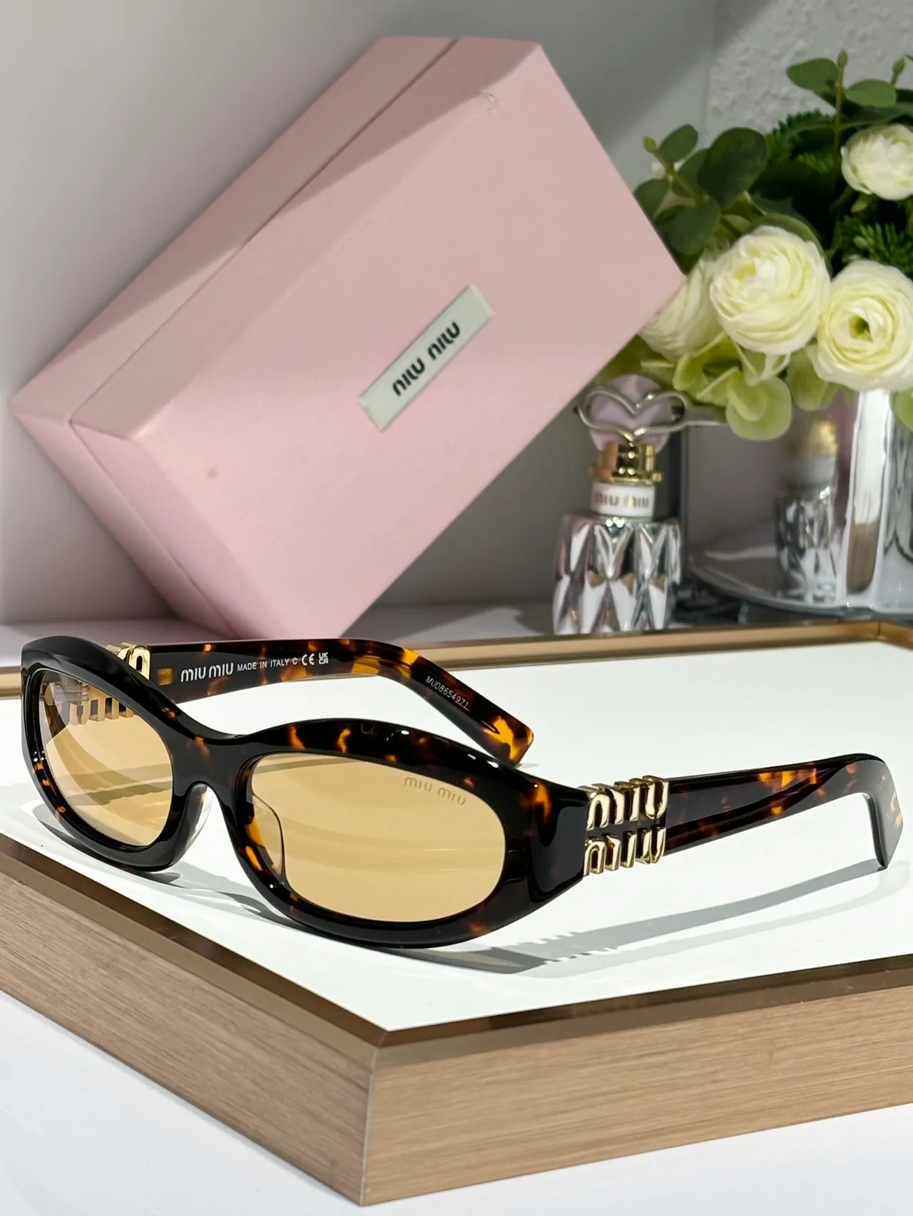 Miu Miu Pink Gold Oval Frame Thick Logo-Embossed Temples Sunglasses 9