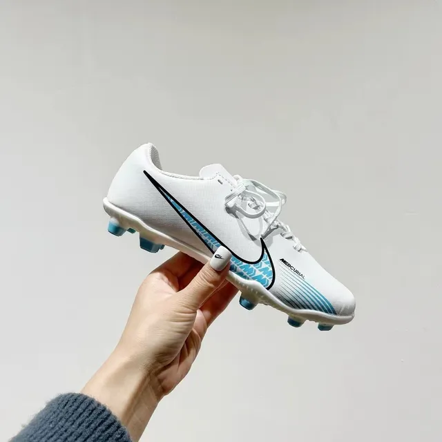 Nike sapatos de futebol turf preto e azul low-cut com upper sintético e studs curtos moldados 23