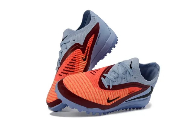 Nike Chuteiras de futebol turf azul e laranja low-cut com upper knit e sintético 2