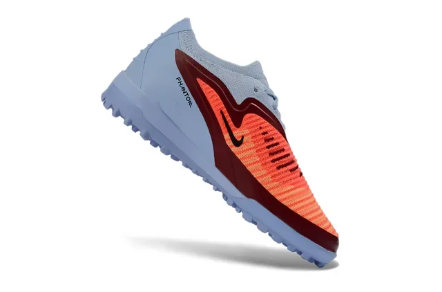 Nike Chuteiras de futebol turf azul e laranja low-cut com upper knit e sintético 3