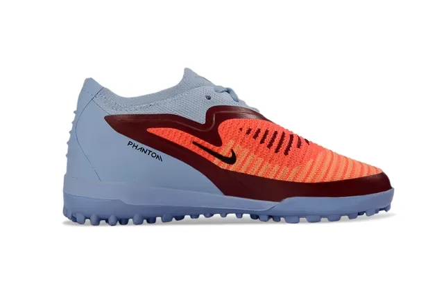 Nike Chuteiras de futebol turf azul e laranja low-cut com upper knit e sintético 7