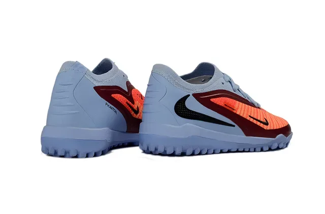 Nike Chuteiras de futebol turf azul e laranja low-cut com upper knit e sintético 8