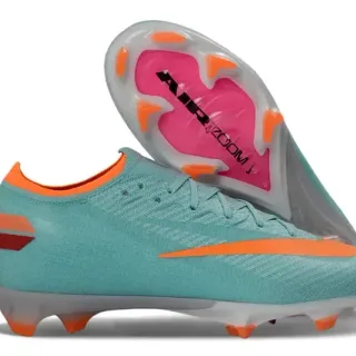Nike كلاتس كرة القدم تيل برتقالي أرض صلبة