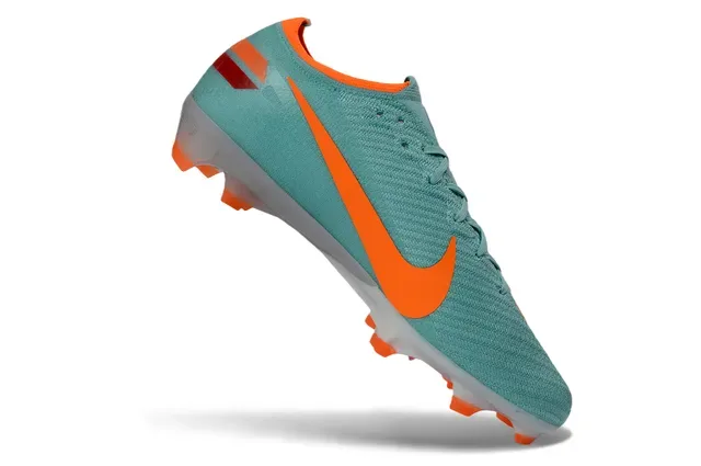 Nike كلاتس كرة القدم تيل برتقالي أرض صلبة 2