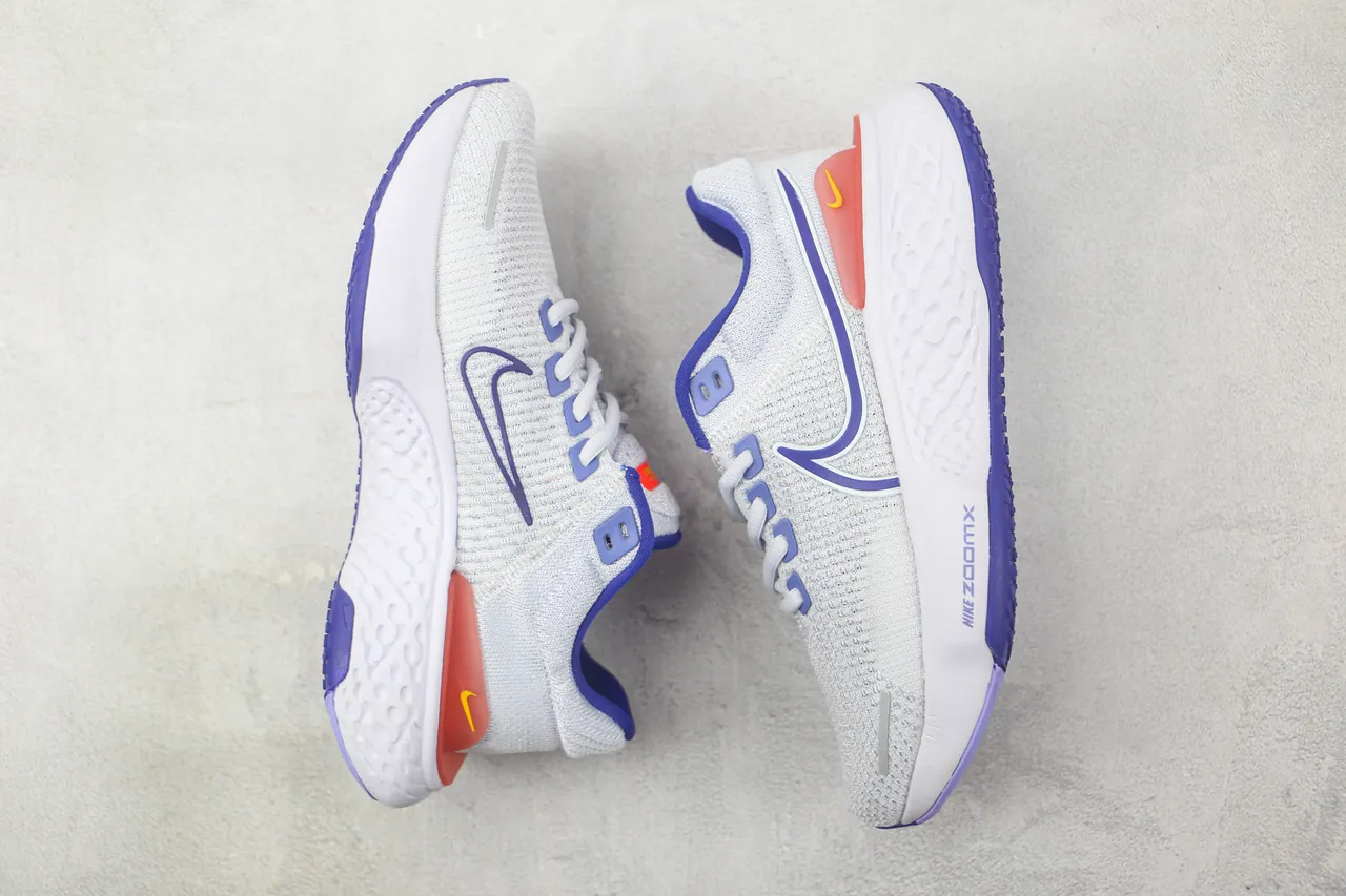 Nike ZoomX Invincible Run Tênis de corrida com upper de knit cinza azul, sola intermediária esculturada ondulada 2