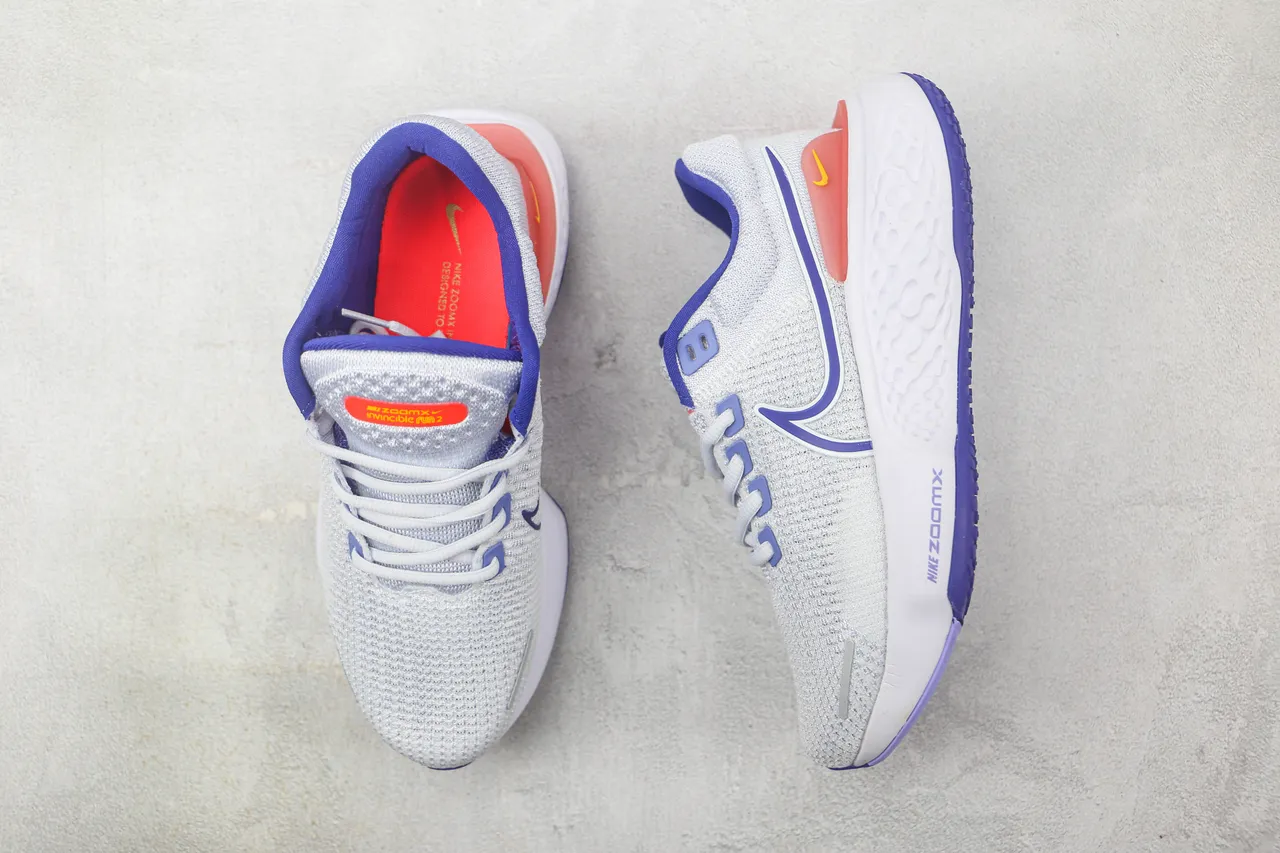 Nike ZoomX Invincible Run Tênis de corrida com upper de knit cinza azul, sola intermediária esculturada ondulada 3