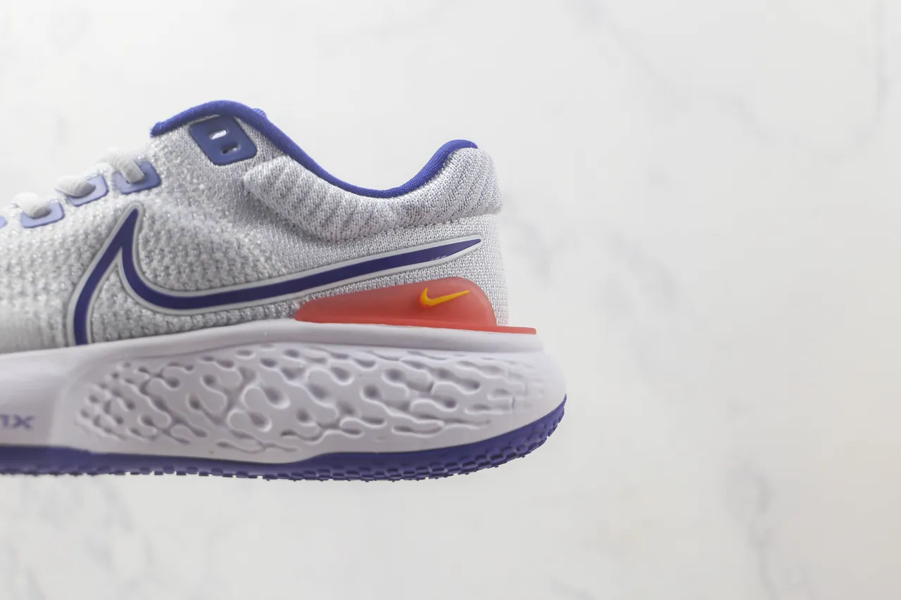 Nike ZoomX Invincible Run Tênis de corrida com upper de knit cinza azul, sola intermediária esculturada ondulada 7