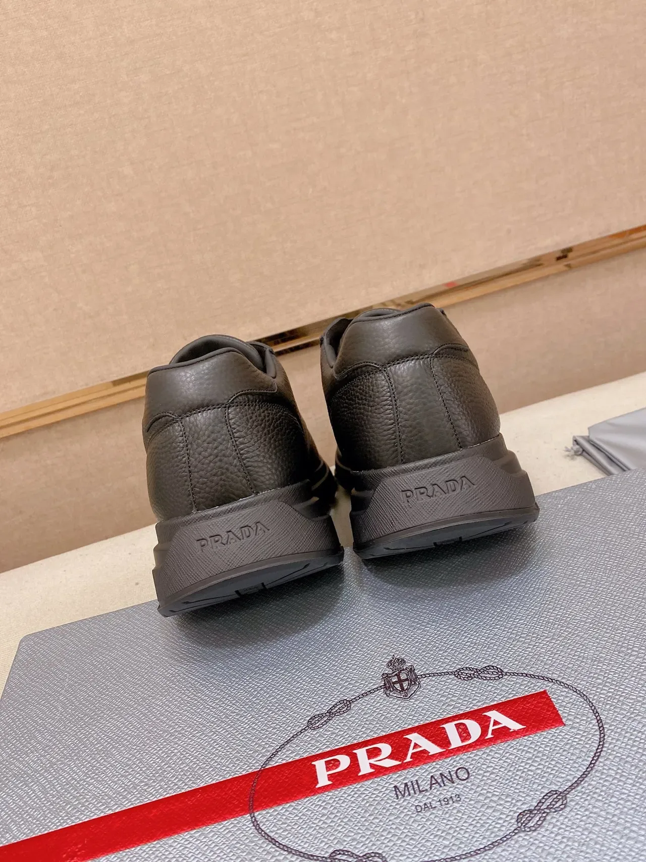 Prada Black Pebbled Leather Triangular Logo Plaque Lifestyle Sneakers 3