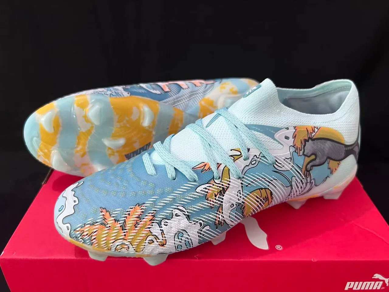Puma Chaussures de football bleu et jaune, coupe basse, partie supérieure en chaussette, terrain ferme 9
