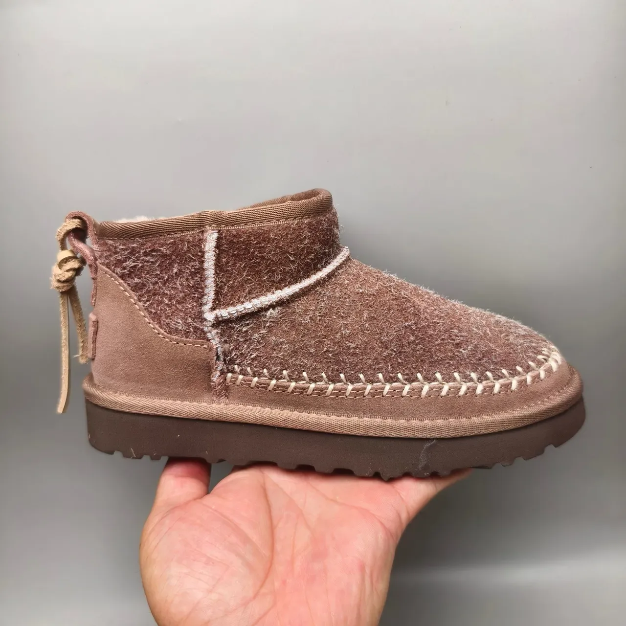 UGG Tasman বাদামী শিয়ারলিং লাইন্ড সুয়েড স্নো বুট 2