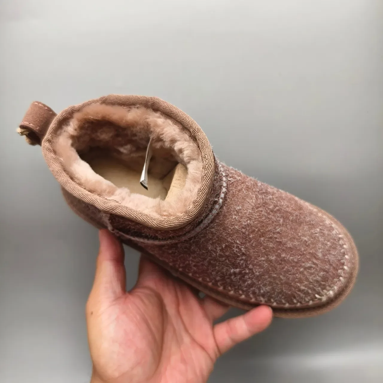 UGG Tasman বাদামী শিয়ারলিং লাইন্ড সুয়েড স্নো বুট 3