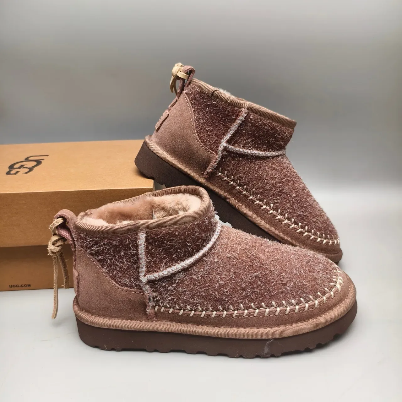 UGG Tasman বাদামী শিয়ারলিং লাইন্ড সুয়েড স্নো বুট 6