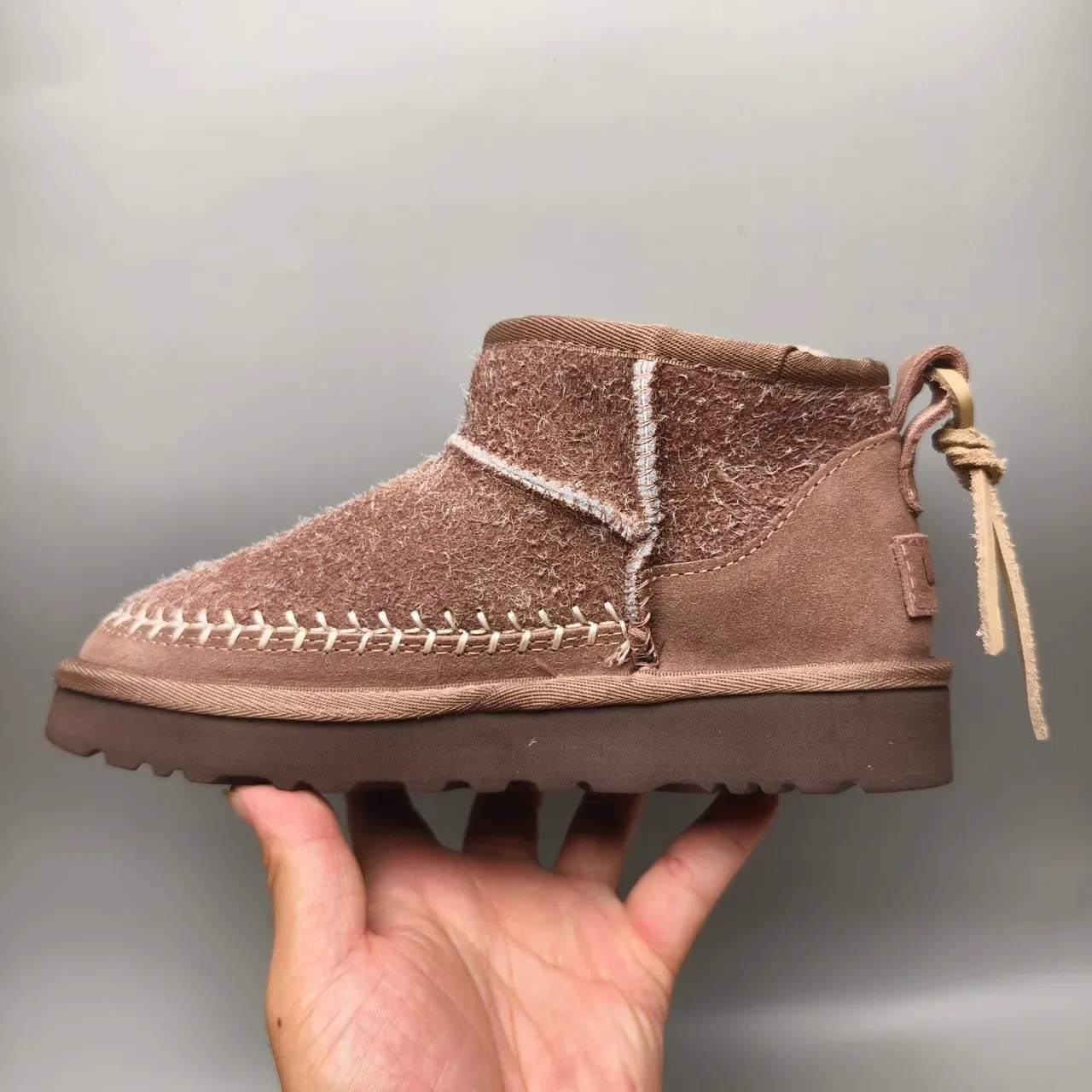 UGG Tasman বাদামী শিয়ারলিং লাইন্ড সুয়েড স্নো বুট 7