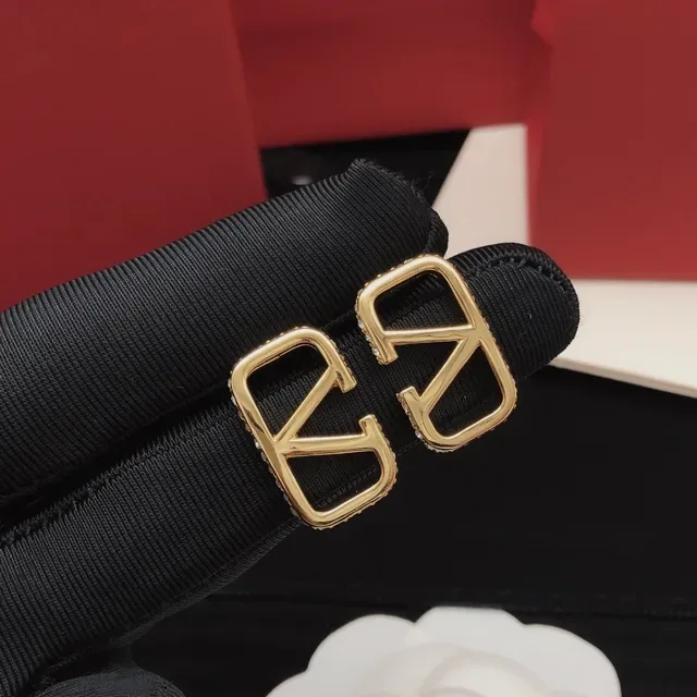 Valentino VLogo أقراط ذهبي أسود إطار مفتوح هندسي حافة Pavé 8