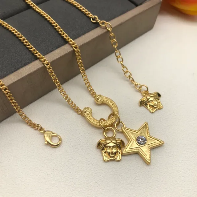 Versace La Medusa Star Colar de corrente tom dourado 2