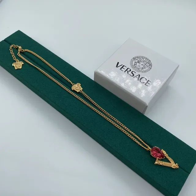 Versace Tête de Méduse et pendentif cristal en or teinté 5
