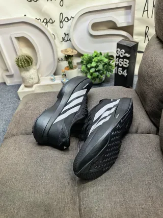 Adidas Black and Silver Three-Stripe Lifestyle Sneakers 6